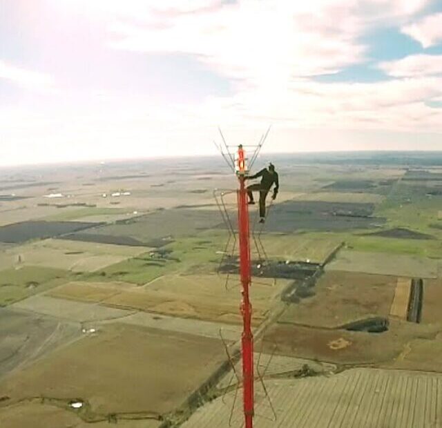 Man climbs California radio tower with Free Billie Eilish sign (2)